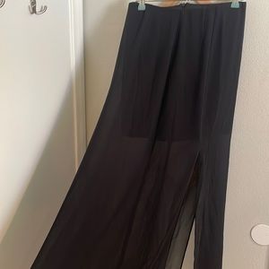 Sheer maxi skirt with mini underlay and side slit.  Festival vacation wear